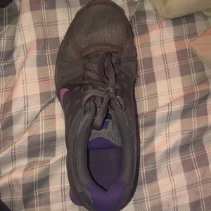 Gray and purple Nike Shox